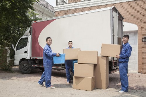 Professional movers handling furniture for a residential move in Harold Park