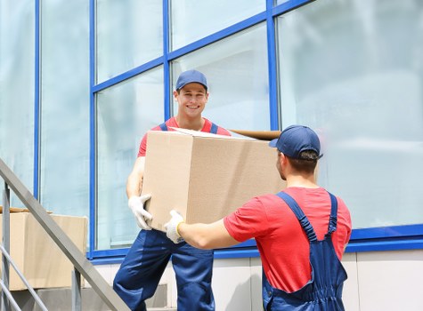 Professional movers handling furniture in Marlow