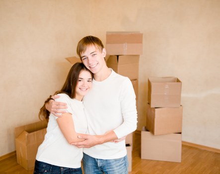 Professional movers handling household items