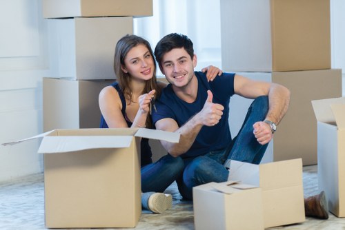Professional removal team loading a van in East Barnet