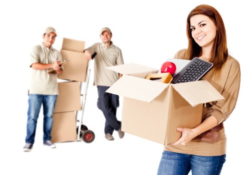 Movers unloading belongings at a Weybridge residence