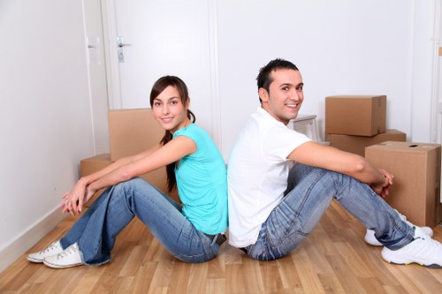 Professional movers handling belongings