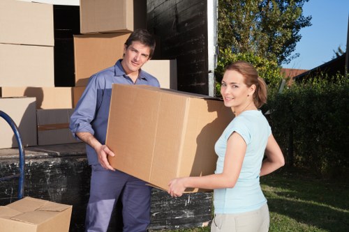 Man and Van removals team safely handling furniture